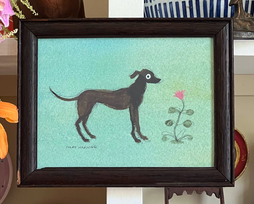 ‘Black Dog with Flowers'